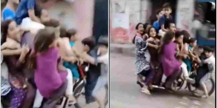 Dozens Of People Sat On A Bike Video Went Viral On All Social Media Platforms – बाइक पर बैठकर बच्चे दिखा रहे थे स्टंट, लोगों ने कहा