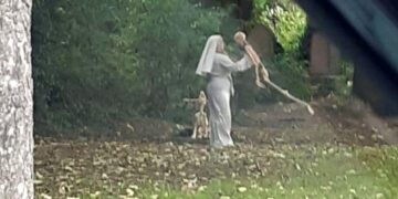 Woman Dressed As Nun Dances With Human And Dog Skeletons Next To Graveyard Know The More Details