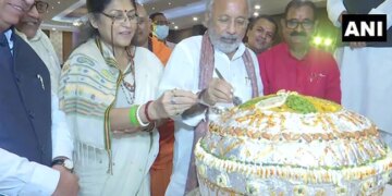 PM Narendra Modi Birthday Celebration Cut 71 Kg Laddu And 71 Feet Long Vaccine Shaped Cake