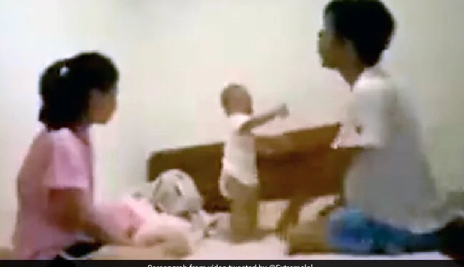 Viral Baby Video Doing Action Scene With His Mom And Dad