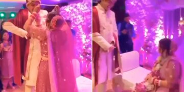 Groom Was Teasing Bride During Varmala Then Bride Did The Trick Sat On The Stage And Then Did Something Like This Watch Viral Video – दूल्हा नहीं डालने दे रहा था वरमाला, फिर दुल्हन ने चली चाल, स्टेज पर ही बैठ गई और फिर किया कुछ ऐसा