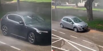 Vehicles Across The City Started Getting Washed Under The Malfunctioning Sprinkler Video Goes Viral On Social Media