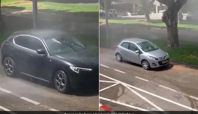 Vehicles Across The City Started Getting Washed Under The Malfunctioning Sprinkler Video Goes Viral On Social Media