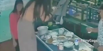 Woman Taking Picture Of Food On The Table Suddenly Balance Disturbed Then What Happened Next You Will Not Stop Laughing