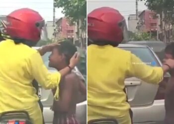 Viral Video Of A Woman Was Seen Helping A Child At A Traffic Signal