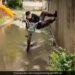 Man Did A Stunt To Save Shoes From Getting Wet On Road Internet Says Ninja – सड़क पर भरे पानी में जूतों को भीगने से बचाने के लिए शख्स ने किया स्टंट, लोग बोले