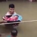 There Was Water Till The Chest, A Small Child Was Trapped In The Flood, The Father Saved His Life By Risking His Life