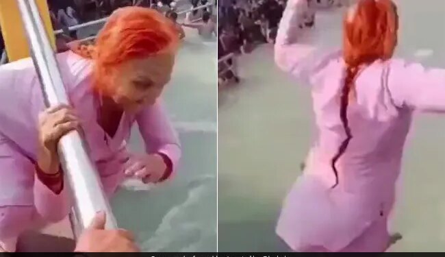 70 Year Elderly Woman Dives Into River Ganga From A Bridge In Haridwar Internet Stuns Watch Viral Video