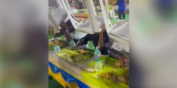 People Were Eating Food In The Wedding Suddenly Start Raining Yet The Guests Were Busy In Eating See Viral Video