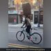 This Man Is Riding A Bicycle With A Suitcase On His Forehead, You Will Be Surprised To See The Video