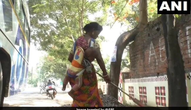 Sanitary Worker Cleans Road While Carrying Her Baby On Her Back In Odisha Internet Gets Emotional See Viral Video