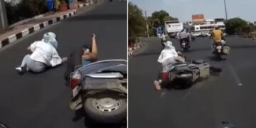 Watch Viral Video: Woman Fell From Scooty Puts Blame On Biker Accident Video Goes Viral On Internet