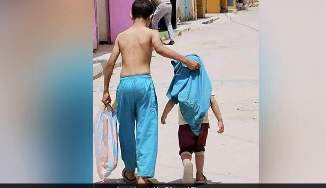 The Younger Brother Was Feeling Hot, So The Elder Took Off His Shirt And Gave It, The Elder Brother Is In The Role Of Father.