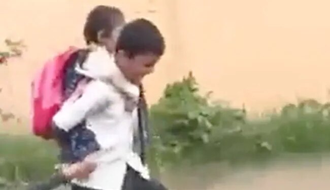 There Was Water All Around, A Brother Told The World The Meaning Of Rakshabandhan By Making His Sister Sit On His Back.