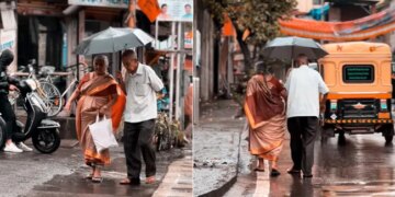 Old Couple Crossing The Road Together In Rain Will Make You Believe In Eternal Love Watch Viral Video