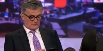 BBC Anchor Scrolling On Phone With Feet Up On Desk Mid Live Broadcast Caught On Camera