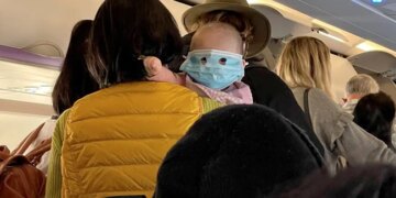 Baby Wearing A Full Face Mask On On New Zealand Flight In Viral Photo Internet Says Example Of Child Abuse