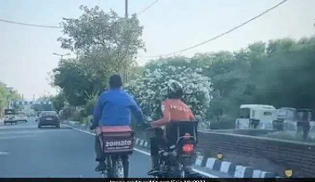 Swiggy Delivery Boy Helps Zomato Delivery Boy Going Bicycle On Road, Video Wins Hearts