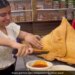 Biggest Samosa Ever Girl Could Not Lift It By Hand Then Ate It By Cutting With Knife See Viral Video