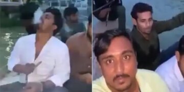 प्रयागराज में गंगा नदी के बीच में नाव पर हुक्का पीते और चिकन पकाते युवाओं का वीडियो वायरल
