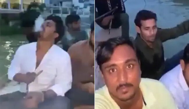 प्रयागराज में गंगा नदी के बीच में नाव पर हुक्का पीते और चिकन पकाते युवाओं का वीडियो वायरल