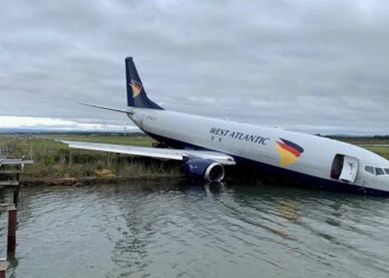 France Cargo Plane Slip Into The Water Inside Of Runway At Airport | Cargo Plane Perilously Overshoots France Airport Runway Ends Up In Lake