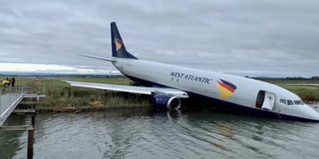 France Cargo Plane Slip Into The Water Inside Of Runway At Airport | Cargo Plane Perilously Overshoots France Airport Runway Ends Up In Lake