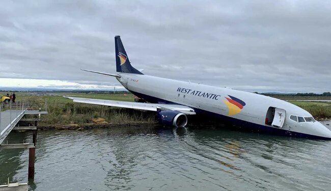 France Cargo Plane Slip Into The Water Inside Of Runway At Airport | Cargo Plane Perilously Overshoots France Airport Runway Ends Up In Lake