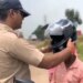 The Policeman Wore A Helmet To A Man Riding A Motorcycle | A Police Officer Is Viral On Social Media Motorcyclist Wearing A Helmet | Policeman Wore The Helmet To The Person With Chanting Mantra