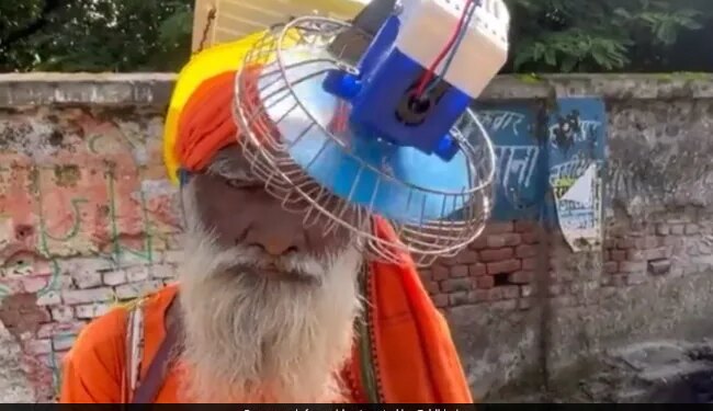 Jugaad Video Baba Wearing Solar Powered Helmet With Fan Internet Says What An Idea Sir Ji Watch Viral Video