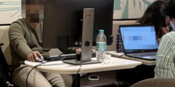 Man Sets Up Desktop At Coffee Shop Amid Bengaluru Floods Internet Has Mixed Says Reactions Dedication Or Stress