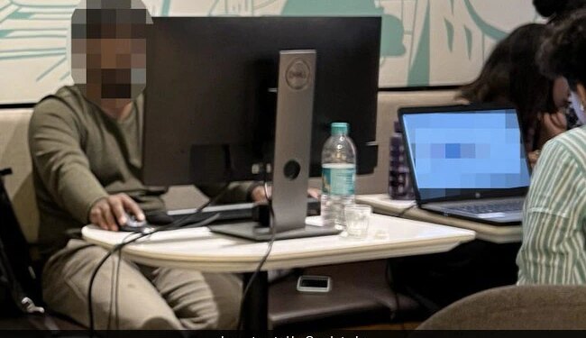 Man Sets Up Desktop At Coffee Shop Amid Bengaluru Floods Internet Has Mixed Says Reactions Dedication Or Stress