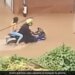 Boy Drive Bike On Flooded Road With Girlfriend People Said This Is Called The Power Of True Love See Viral Video – गर्लफ्रेंड को बैठाकर बाढ़ से भरी सड़क पर दौड़ाई बाइक, लोग बोले