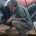 Man Eating Food Sitting On The Roadside Amid Heavy Rains Heartbreaking Video Goes Viral