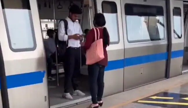 Video Of Girl Running Away From Boys Hand At Metro Station With Mobile Phone Goes Viral On Social Media