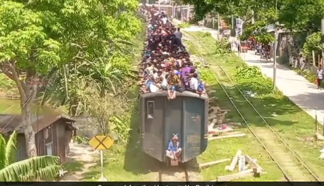 People Travelling On Train Roof And Engines In Bangladesh Watch Viral Video