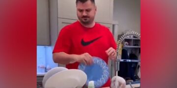 Father Washing Dishes Together While Bathing The Baby In The Sink Funny Video Goes Viral