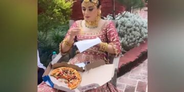 The Video Of The Bride Enjoying Pizza On The Occasion Of The Wedding Went Viral, People Said – Who Eats At Her Wedding? – शादी के मौके पर पिज्जा का आनंद लेते हुए दुल्हन का वीडियो हुआ वायरल, लोगों ने कहा