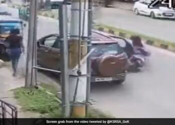 Woman Rider Run Over After Being Hit By Door Of Parked Car Suddenly High Speed Car Passed Over Her Caught On Camera