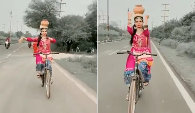 VIDEO: Classical Dance On A Cycle With An Urn On Her Head The Girl Won Her Heart
