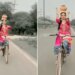 VIDEO: Classical Dance On A Cycle With An Urn On Her Head The Girl Won Her Heart
