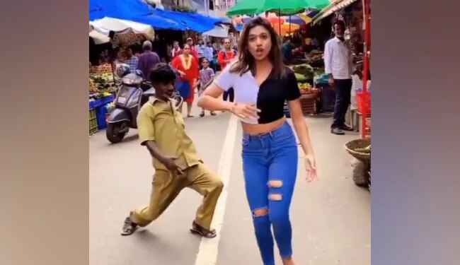 The Girl Was Dancing On The Song Dilbar-Dilbar In The Middle Of The Road, When The Uncle Also Started Dancing.