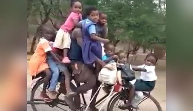 Kids Going To School On Cycle: Viral Video Of A Man Carrying 9 Kids On One Cycle To School
