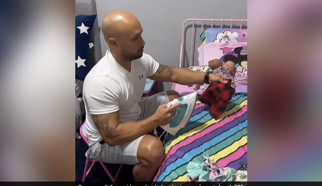 Father Ironing Clothes Of Daughter Dolls Internet Loves It See Viral Video