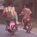 Girl Falls While Trying To Kick A Bike Rider Video Viral, Woman Falls While Trying To Kick Bike Rider