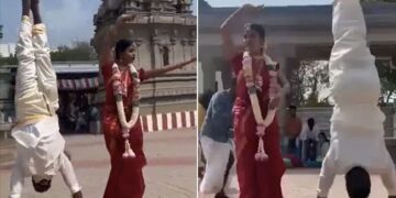 Weird Photoshoot: Groom Standing On His Head In Frant Of Bride Pre Wedding Photoshoot