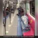 Boy Lying Down On The Delhi Metro Seat Started Sleeping Covered With A Bedsheet Passengers Shocked To See It See Viral Video