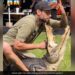 Man Trying To Put His Hand In Crocodile Mouth Then What Happened Next You Will Be Shocked See Watch Shocking Viral Video