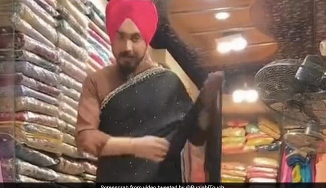 Man Drapes Saree At A Store Internet Amused With His Skills See Viral Video – सरदार जी ने इतनी तेज़ रफ्तार में पहनी साड़ी, हैरान रह गए दुकान पर बैठे लोग, बोले