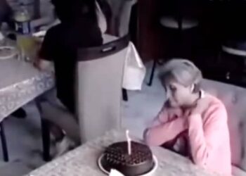 A Woman Was Celebrating Her Birthday By Cutting A Cake Alone, Then Something Happened That Will Make You Emotional